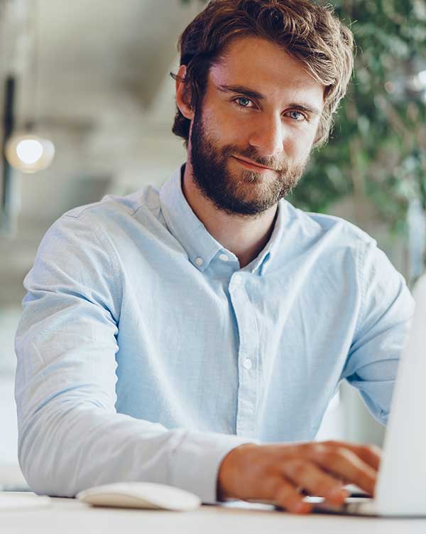 man working at computer