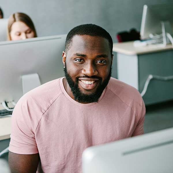 man working at computer