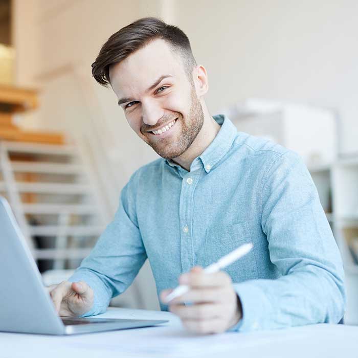 man applying for job at computer