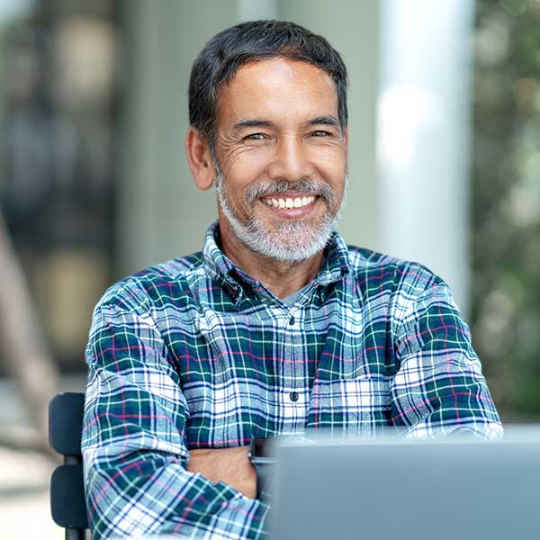 mature man working at desk